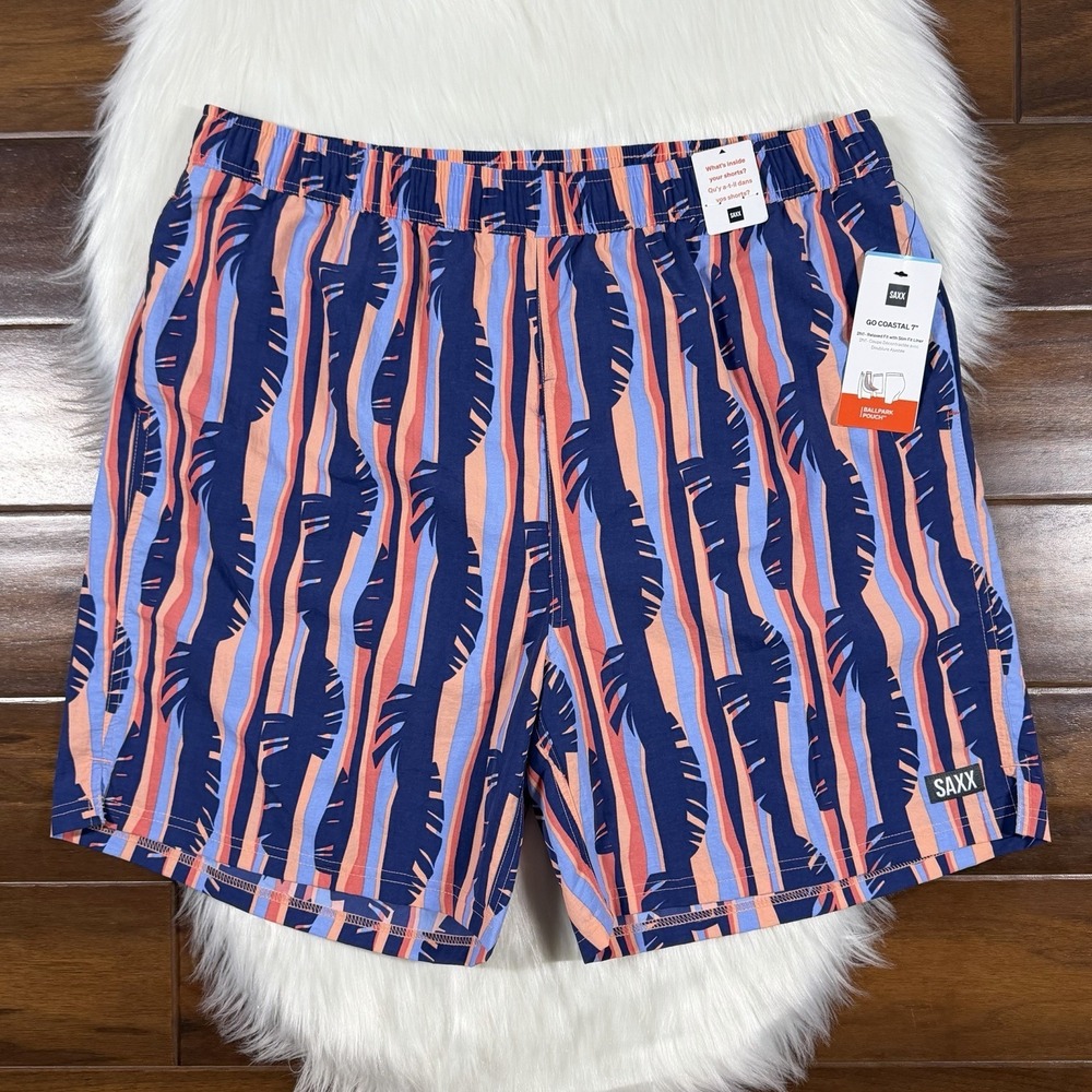 Saxx Men's Swim Trunks in Navy, Coral, and Light Blue Tropical Stripe